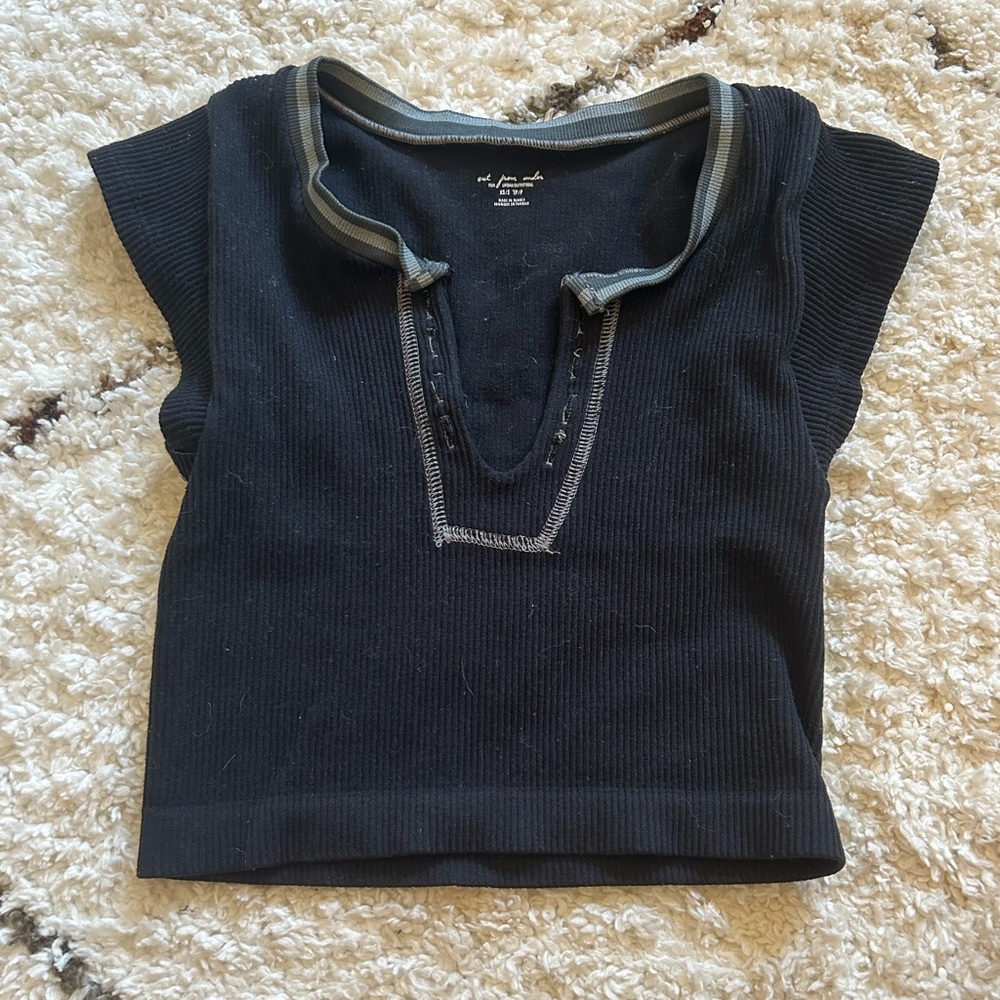 Out from under black baby tee shirt
